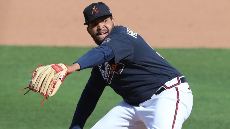 Atlanta Braves pitcher Daysbel Hernandez delivers a pitch against the Minnesota Twins during the sixth inning of an MLB spring training baseball game Tuesday, March 2, 2021, in North Port, Fla. (Curtis Compton/Atlanta Journal-Constitution via AP)