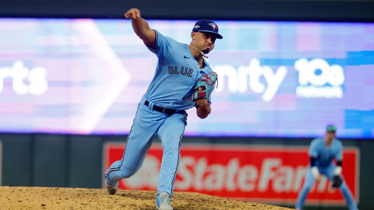 Toronto Blue Jays relief pitcher Jordan Hicks throws to a Minnesota Twins batter during the eighth inning in Game 1 of an AL wild-card baseball playoff series. (Bruce Kluckhohn/AP)