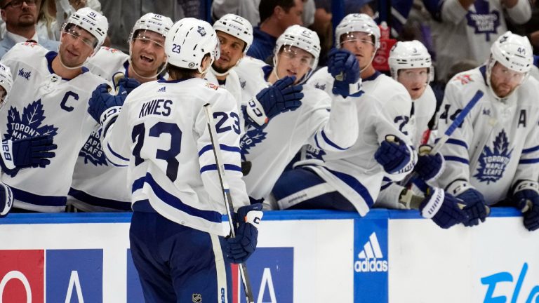 Toronto Maple Leafs left wing Matthew Knies (23) celebrates with the bench after his goal against the Tampa Bay Lightning during the third period of an NHL hockey game Saturday, Oct. 21, 2023, in Tampa, Fla. (Chris O'Meara/AP)