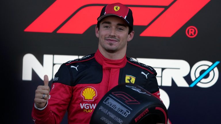 Charles Leclerc, of Monaco, celebrates with his trophy after winning pole position during the Formula One Mexico Grand Prix auto race at the Hermanos Rodriguez racetrack in Mexico City, Saturday, Oct. 28, 2023. (Fernando Llano/AP)