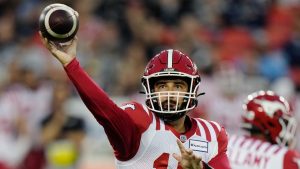 Former Calgary Stampeders quarterback Jake Maier (12) passes against the Toronto Argonauts during first half CFL football action in Toronto on Friday, August 25, 2023. (Frank Gunn/CP)