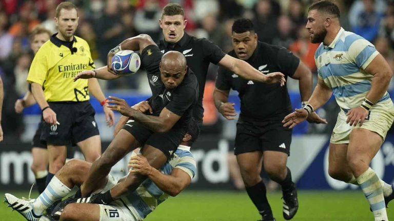 New Zealand's Mark Telea is brought down by Argentina's Agustin Creevy during the Rugby World Cup semifinal match between Argentina and New Zealand at the Stade de France in Saint-Denis. (Christophe Ena/AP)