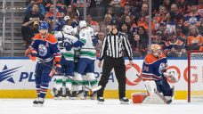 Canucks badly outshot, but still hold off Oilers to start season 2-0