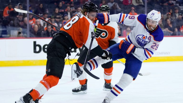 Philadelphia Flyers' Marc Staal, left, and Edmonton Oilers' Leon Draisaitl collide during the first period of an NHL hockey game, Thursday, Oct. 19, 2023, in Philadelphia. (Matt Slocum/AP)