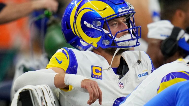 Los Angeles Rams quarterback Matthew Stafford watches from the bench with a bandage on his throwing hand during the second half of an NFL football game against the Dallas Cowboys Sunday, Oct. 29, 2023, in Arlington, Texas. (Julio Cortez/AP Photo)