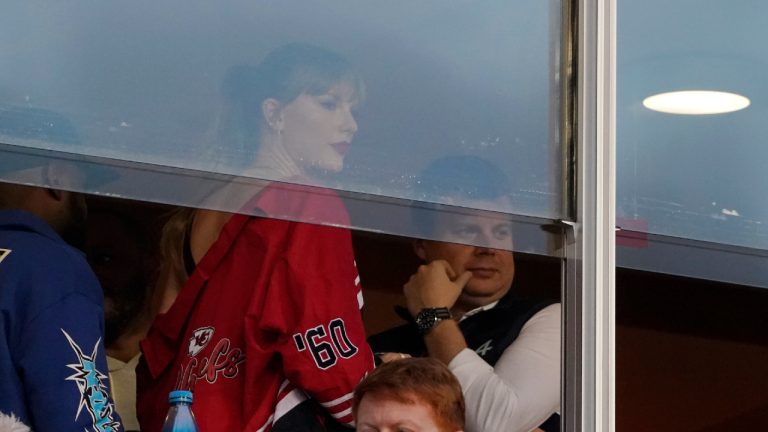 Taylor Swift waits for an NFL football game between the Kansas City Chiefs and the Denver Broncos, Thursday, Oct. 12, 2023, in Kansas City, Mo. (Ed Zurga/AP)