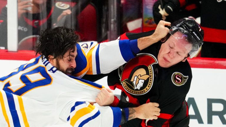 Ottawa Senators left wing Brady Tkachuk (right) and Buffalo Sabres right wing Alex Tuch (89) fight during third period NHL hockey action in Ottawa on Tuesday, Oct. 24, 2023. (Sean Kilpatrick/THE CANADIAN PRESS)