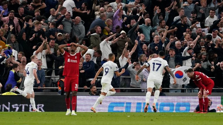 Players of Tottenham celebrate after Liverpool's Joel Matip scored an own goal during the English Premier League soccer match between Tottenham Hotspur and Liverpool at the Tottenham Hotspur Stadium, in London, England, Saturday, Sept. 30, 2023. (Alberto Pezzali/AP)