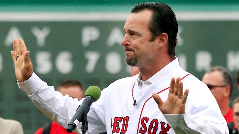 FILE - Boston Red Sox pitcher Tim Wakefield becomes emotional as he speaks to the crowd during a ceremony to honoUr his career prior to a baseball game against the Seattle Mariners at Fenway Park in Boston, Tuesday, May 15, 2012. (Elise Amendola/AP)