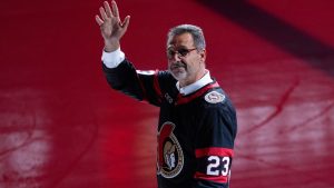 New Ottawa Senators owner Michael Andlauer waves to fans as he makes his way to the ceremonial face-off as the Ottawa Senators play their first home game against the Philadelphia Flyers before NHL action, Saturday, October 14, 2023 in Ottawa. (Adrian Wyld/CP)