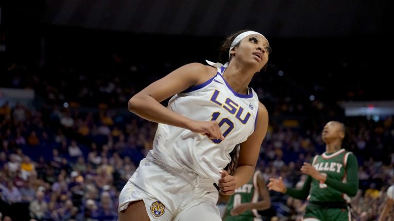 LSU forward Angel Reese (10) smiles after making a basket against Mississippi Valley State guard Jaylia Reed during the first half of an NCAA basketball game on Sunday, Nov. 12, 2023, in Baton Rouge, La. (Matthew Hinton/AP Photo)