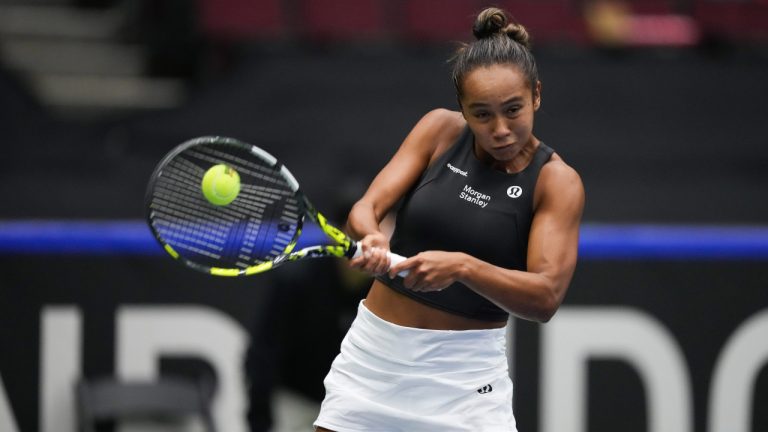 Canada's Leylah Fernandez returns to Belgium's Yanina Wickmayer during a Billie Jean King Cup qualifiers singles match, in Vancouver, on Friday, April 14, 2023. (Darryl Dyck/CP)