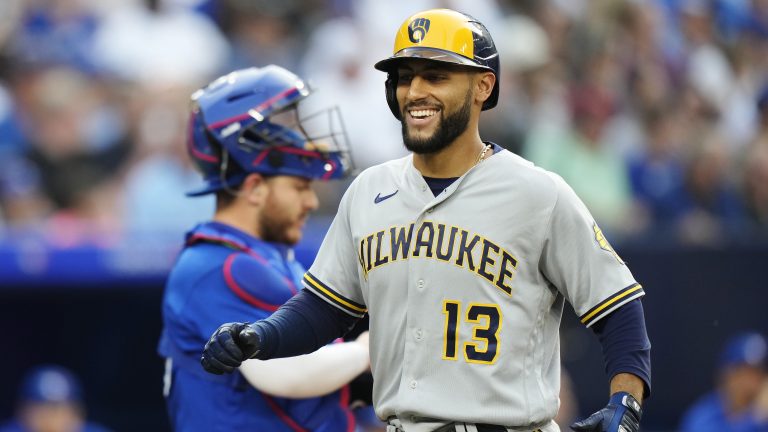 Milwaukee Brewers' Abraham Toro (13) celebrates his two-run home run against the Toronto Blue Jays during second inning MLB baseball action in Toronto on Wednesday, May 31, 2023. (Frank Gunn/CP)