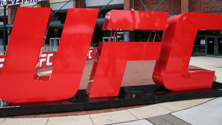 A UFC logo stands outside an arena. (AP)