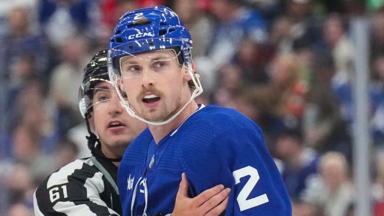 Toronto Maple Leafs' Simon Benoit looks back after a penalty during NHL preseason hockey action against the Detroit Red Wings in Toronto, on Thursday, October 5, 2023. (CP)