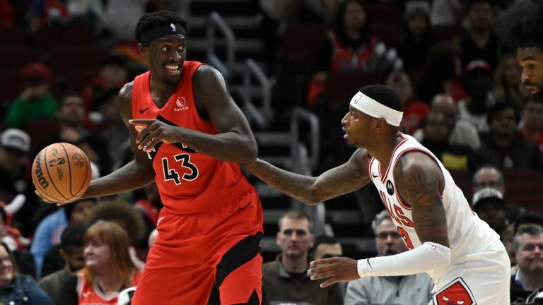 Toronto Raptors forward Pascal Siakam (43) looks to pass the ball against Chicago Bulls forward Torrey Craig during the first half of a preseason NBA basketball game, Tuesday, Oct. 17, 2023, in Chicago. (Matt Marton/AP)