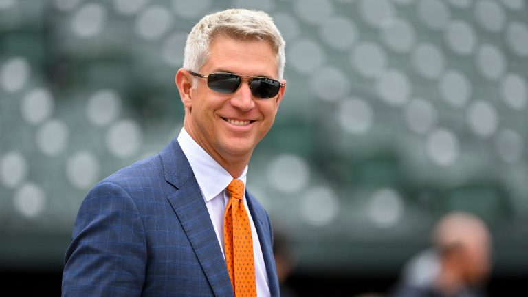 FILE - Baltimore Orioles executive vice president and general manager Mike Elias smiles during batting practice before an opening day baseball game against the New York Yankees, Friday, April 7, 2023, in Baltimore. Elias was voted Major League Baseball's Executive of the Year on Tuesday, Nov. 7, after the team finished with the American League's best record for the first time since 1997. (Terrance Williams/AP) 