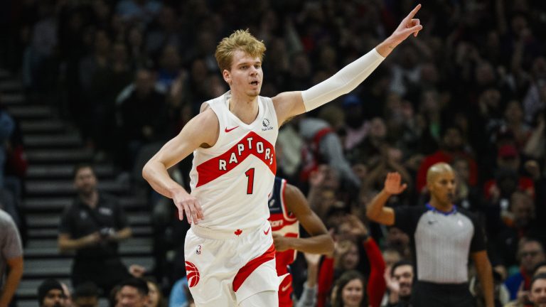 Toronto Raptors guard Gradey Dick (1) celebrates after scoring a three point basket during first half NBA basketball action against the Washington Wizards, in Toronto on Monday, November 13, 2023. (Christopher Katsarov/CP)