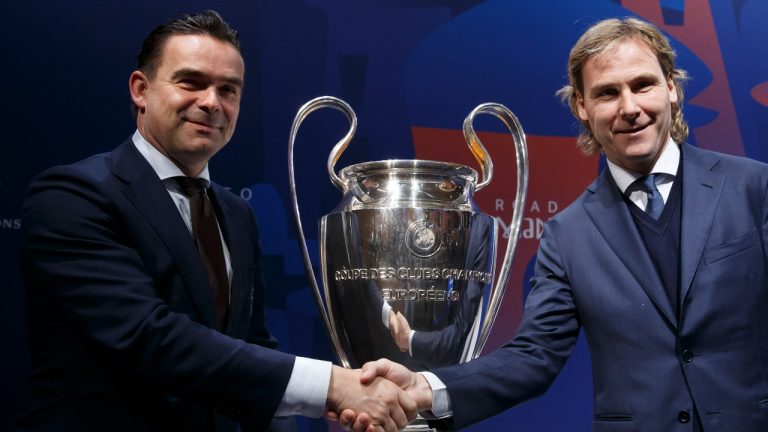 Marc Overmars, left, Director of Football of AFC Ajax, shakes hands with Pavel Nedved, Vice President of Juventus FC, at the UEFA headquarters in Nyon, Switzerland, Friday, March 15, 2019. Former Dutch soccer great Marc Overmars has been suspended one year from working in soccer in the Netherlands after admitting to sending inappropriate messages to female colleagues, it was announced Thursday, Nov. 16, 2023. Overmars relinquished his sports director role at Ajax last year and apologized for his behavior because of the scandal. (Salvatore Di Nolfi/Keystone via AP, file)