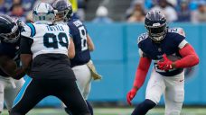 Derrick Henry runs for two touchdowns as Titans hold off Panthers