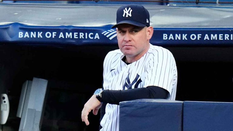 New York Yankees bench coach Carlos Mendoza watches the first inning of a baseball game against the San Diego Padres. (Frank Franklin II/AP)