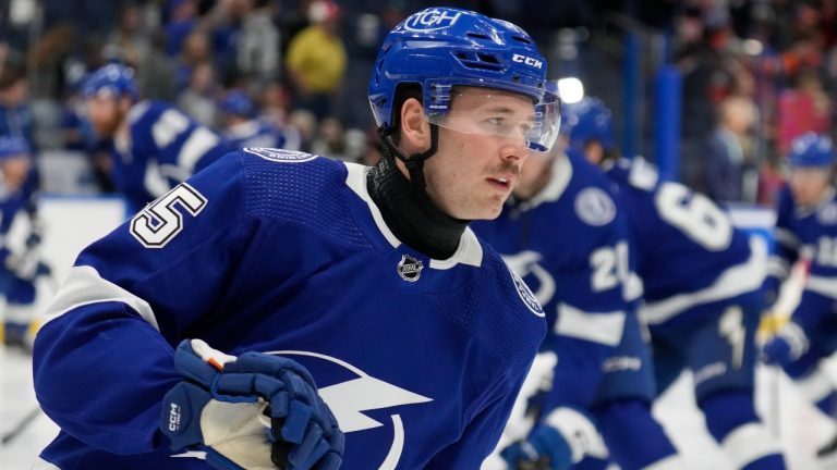 Tampa Bay Lightning left winger Cole Koepke wears a protective neck guard before an NHL hockey game against the Edmonton Oilers Saturday, Nov. 18, 2023, in Tampa, Fla.  (Chris O'Meara/AP Photo)