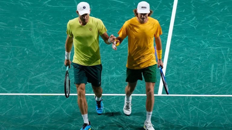 Australia's Matthew Ebden, left, and Max Purcell react during a Davis Cup quarter-final tennis match against Jiri Lehecka of the Czech Republic and Adam Pavlasek of the Czech Republic in Malaga, Spain, Wednesday, Nov. 22, 2023. (Manu Fernandez/AP Photo)