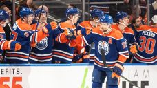 Knoblauch steers Oilers to NHL coaching debut win over slumping Islanders