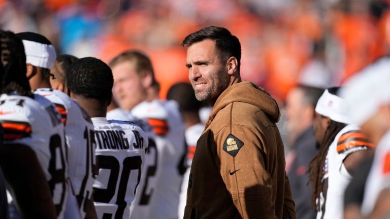 Cleveland Browns quarterback Joe Flacco stands with teammates during the playing of the national anthem before the Browns face the Denver Broncos in an NFL football game Sunday, Nov. 26, 2023, in Denver. (David Zalubowski/AP Photo)