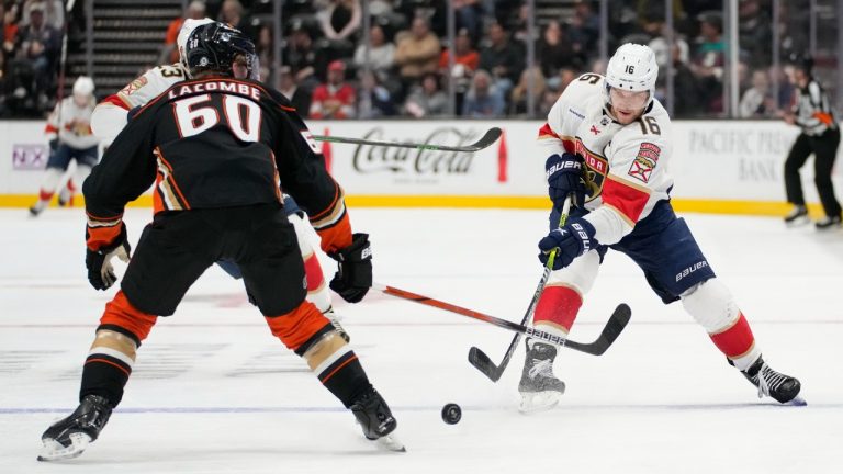 Florida Panthers center Aleksander Barkov (16) passes against Anaheim Ducks defenceman Jackson LaCombe (60) during the second period of an NHL hockey game in Anaheim, Calif., Friday, Nov. 17, 2023. (Ashley Landis/AP)