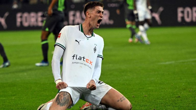 Gladbach's Tomas Cvancara celebrates scoring during the Bundesliga match between Borussia Monchengladbach and VfL Wolfsburg at Borussia-Park stadium, Monchengladbach, Germany, Friday Nov. 10, 2023. (Federico Gambarini/dpa via AP)