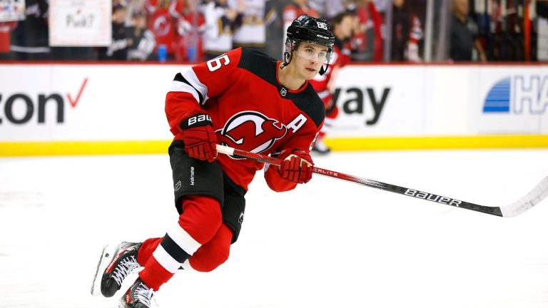 New Jersey Devils centre Jack Hughes skates during a warm up before an NHL hockey game against the Minnesota Wild, Sunday, Oct. 29, 2023, in Newark, N.J. (Noah K. Murray/AP Photo)