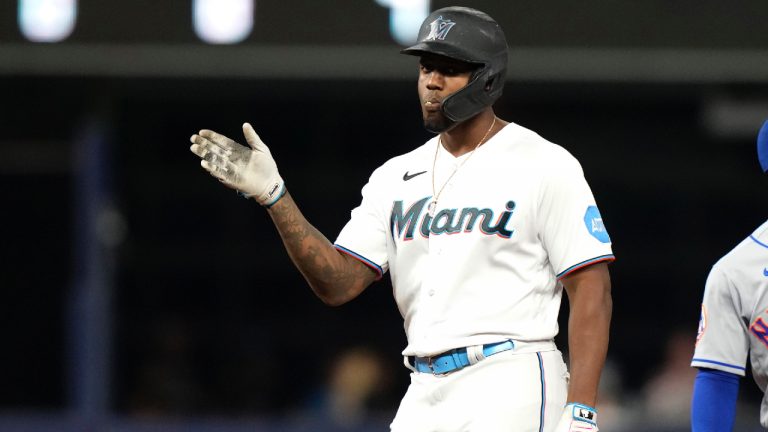 Miami Marlins' Jorge Soler reacts after hitting a double against the New York Mets during the third inning of a baseball game Tuesday, Sept. 19, 2023, in Miami. (Lynne Sladky/AP)