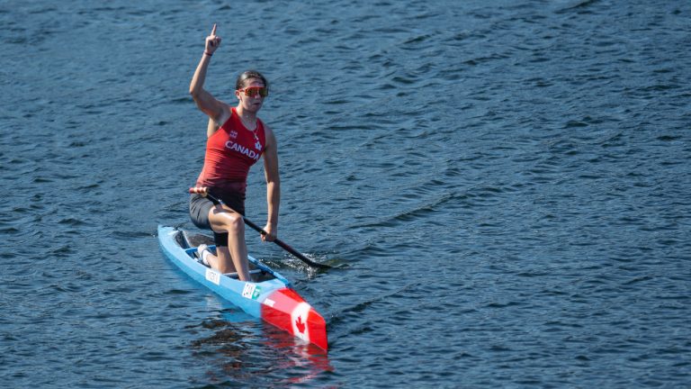 Katie Vincent, of Canada, reacts after winning gold in the C1 womens 5000m during the ICF Canoe Sprint and Paracanoe World Championships in Dartmouth, N.S. on Sunday, August 7, 2022. (Darren Calabrese/CP)