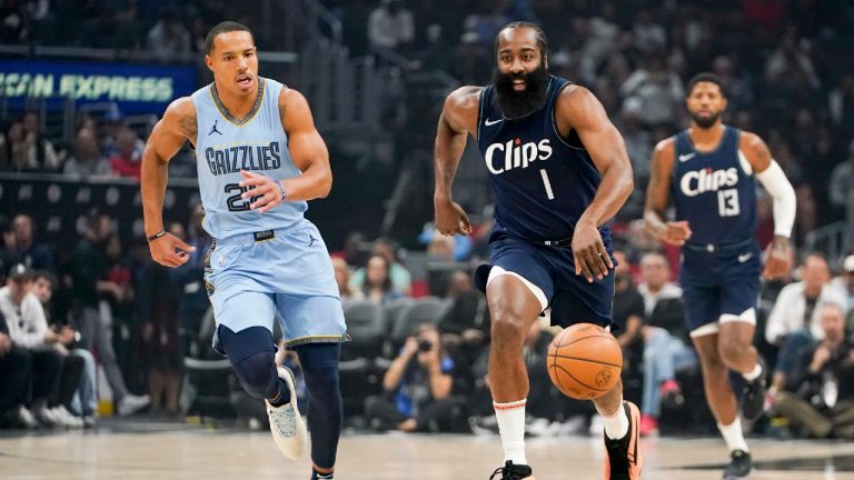 LA Clippers guard James Harden (1) dribbles as Memphis Grizzlies guard Desmond Bane (22) chases during the first half of an NBA basketball game, Sunday, Nov. 12, 2023, in Los Angeles. (Ryan Sun/AP)