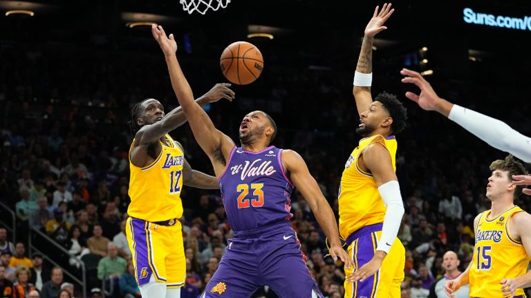 Phoenix Suns guard Eric Gordon (23) has his shot blocked by Los Angeles Lakers forward Taurean Prince (12) during the first half of an NBA basketball game, Friday, Nov. 10, 2023, in Phoenix. (Matt York/AP)