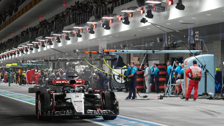 AlphaTauri driver Daniel Ricciardo, of Australia, leaves the pits during qualifications for the Formula One Las Vegas Grand Prix auto race, Saturday, Nov. 18, 2023, in Las Vegas. (Darron Cummings/AP)