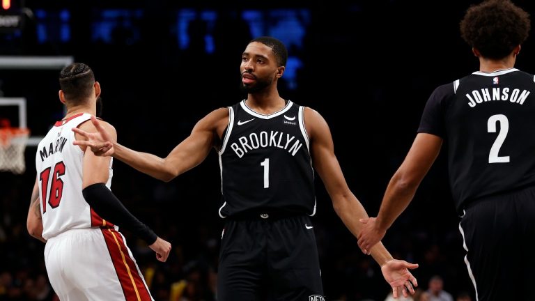 Brooklyn Nets forward Mikal Bridges (1) reacts after making a three-point basket against the Miami Heat during the second half of an NBA basketball game, Saturday, Nov. 25, 2023, in New York. (Adam Hunger/AP)