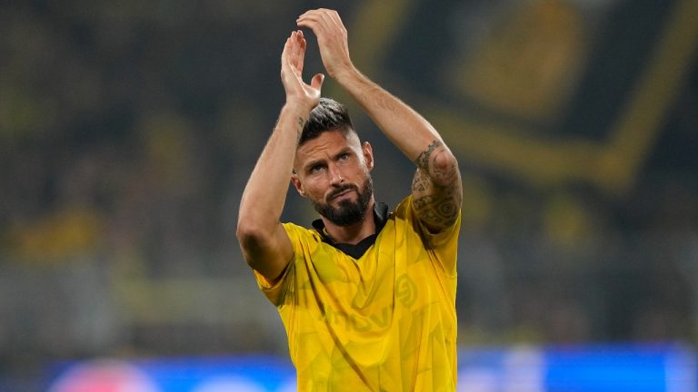 AC Milan's Olivier Giroud claps hands to supporters after the UEFA Champions League Group F soccer match between Borussia Dortmund and AC Milan in Dortmund, Germany, Wednesday, Oct. 4, 2023. (Martin Meissner/AP Photo)