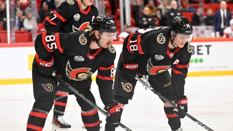 Ottawa Senators Jake Sanderson, 85, Brady Tkachuk, 7, and Tim Stützle, 18, wait for the puck during the NHL Global Series Sweden ice hockey match between Detroit Red Wings and Ottawa Senators at Avicii Arena in Stockholm, Sweden, on Thursday, Nov. 16, 2023. (Henrik Montgomery/TT News Agency via AP)