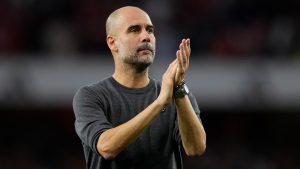 Manchester City's head coach Pep Guardiola applauds to supporters after his team lost the English Premier League soccer match between Arsenal and Manchester City at the Emirates Stadium in London, Sunday, Oct. 8, 2023.(Kirsty Wigglesworth/AP Photo)