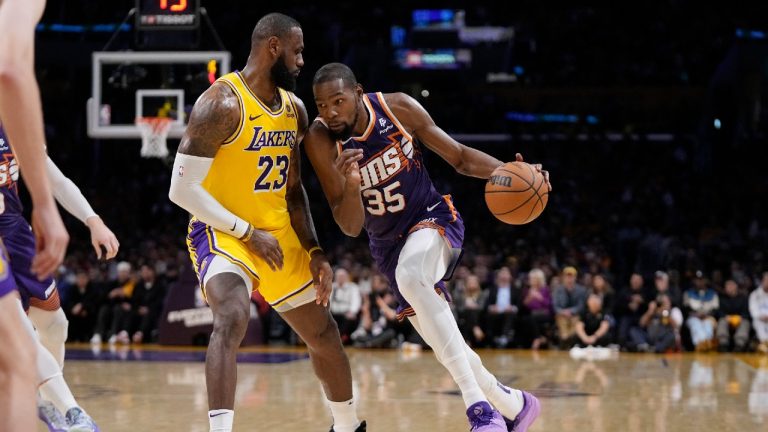 Phoenix Suns forward Kevin Durant, right, tries to drive by Los Angeles Lakers forward LeBron James during the second half of an NBA basketball game Thursday, Oct. 26, 2023, in Los Angeles. (Mark J. Terrill/AP)