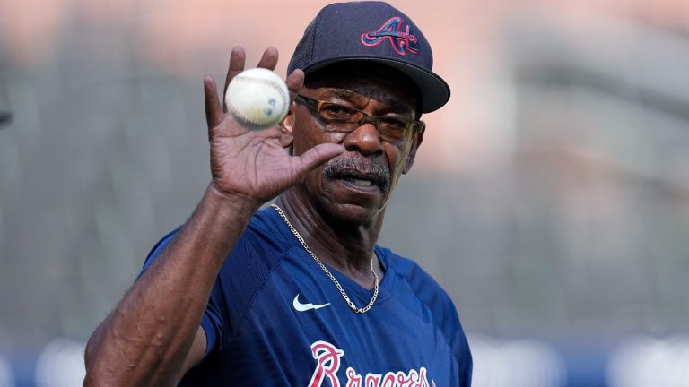 Atlanta Braves third base coach Ron Washington (37) hits ground balls to his infieldersd before a baseball game against the New York Mets Monday, Aug. 21, 2023, in Atlanta. (John Bazemore/AP)