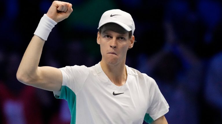 Italy's Jannik Sinner celebrates after winning the singles tennis match against Denmark's Holger Rune, of the ATP World Tour Finals at the Pala Alpitour, in Turin, Italy, Thursday, Nov. 16, 2023. (Antonio Calanni/AP)