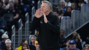 Golden State Warriors head coach Steve Kerr reacts toward officials during the first half of an NBA basketball game.(Jeff Chiu/AP)