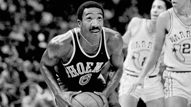 Walter Davis controls the ball against the Golden State Warriors in the first half of the Phoenix Suns' NBA game in Oakland, Calif., Oct. 18, 1978. Davis, a five-time NBA All-Star who had his number retired by the Phoenix Suns, has died. He was 69. Davis was star in college for North Carolina where he played for the late Dean Smith. The school's release said Walter Davis died Thursday morning, Nov. 2, 2023, of natural causes while visiting family in Charlotte, North Carolina. (AP Photo)