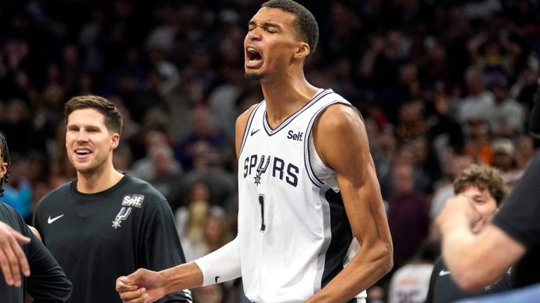 San Antonio Spurs' Victor Wembanyama pumps his fist after the team's win over the Phoenix Suns in an NBA basketball game in Phoenix, Tuesday, Oct. 31, 2023. The Spurs won 115-114. (Darryl Webb/AP)