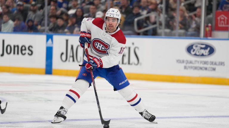 Montreal Canadiens' Alex Newhook (15) handles the puck during the third period of an NHL hockey game against the St. Louis Blues Saturday, Nov. 4, 2023, in St. Louis. (Jeff Roberson/AP)