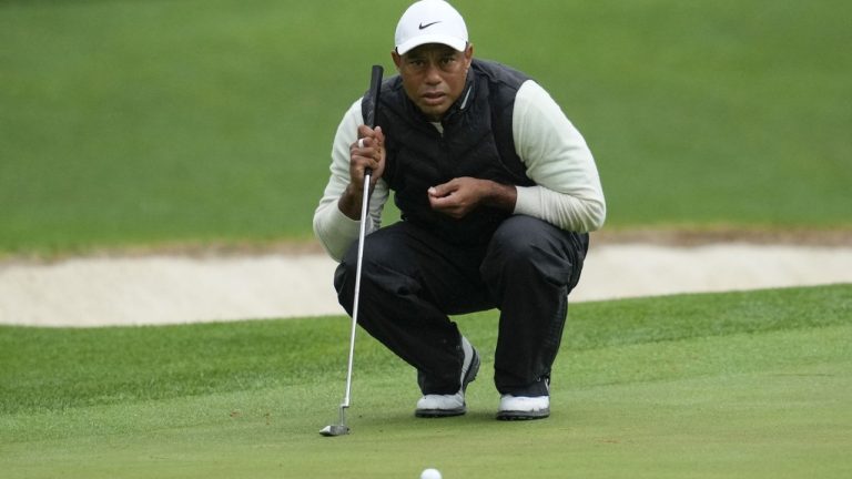 FILE - Tiger Woods lines up a putt on the 16th hole during the weather delayed second round of the Masters golf tournament at Augusta National Golf Club Saturday, April 8, 2023, in Augusta, Ga. (Mark Baker/AP)