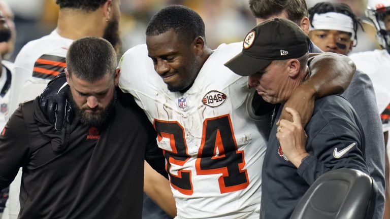 FILE - Cleveland Browns running back Nick Chubb (24) is helped to a cart after getting injured in an NFL football game against the Pittsburgh Steelers, Monday, Sept. 18, 2023, in Pittsburgh. Chubb had successful surgery Wednesday, Nov. 14, 2023, to repair the torn anterior cruciate ligament in his left knee, a season-ending injury he sustained in Week 2 at Pittsburgh. (Gene J. Puskar/AP)